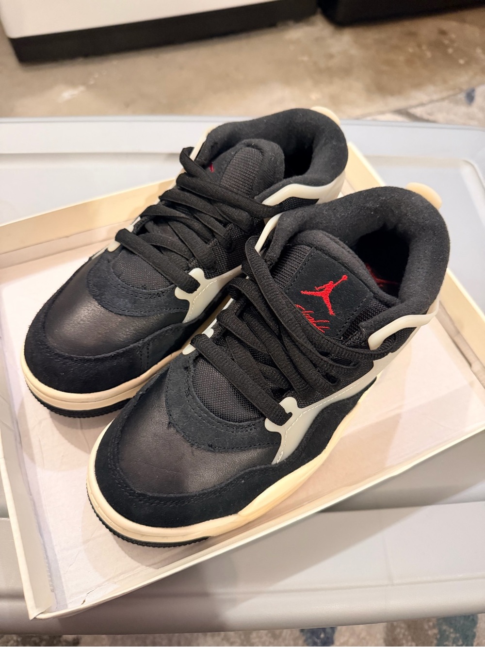 Size 6Y Jordan Black Sneakers with Cream Accents and Red Jumpman
